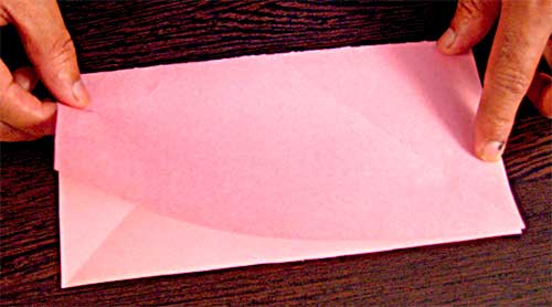 Step 1 to make paper snowflakes