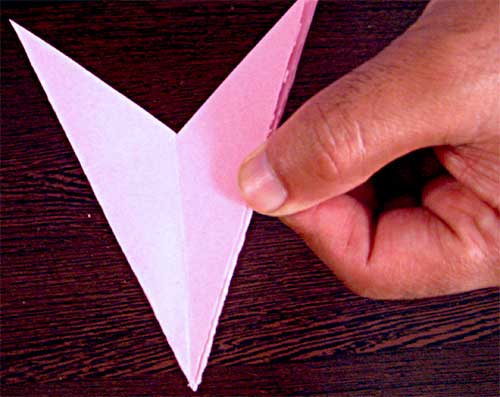 Step 7 to make paper snowflakes
