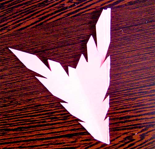 Step 9 to make paper snowflakes